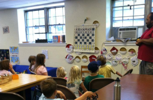 Leteef Street teaching a group of children.